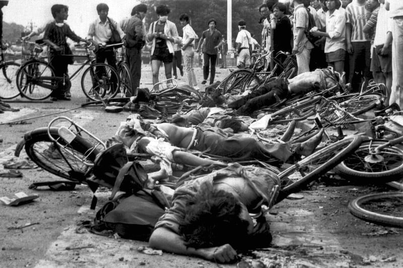 The bodies of dead civilians lie among mangled bicycles near Beijing's Tiananmen Square in this June 4, 1989 file photo. Credit: AP