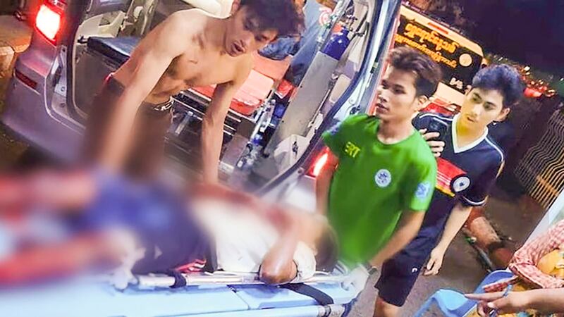 Patients injured in a bomb blast near Sule Bridge are transported to Yangon Hospital. Blurring in photo is from source. (Citizen Journalist)