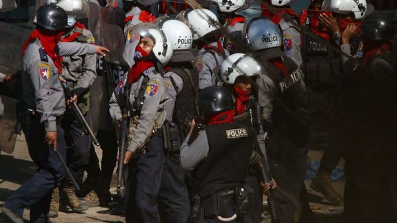 myanmar-police-after-dispersing-protest-sanchaung-yangon-mar5-2021.jpg