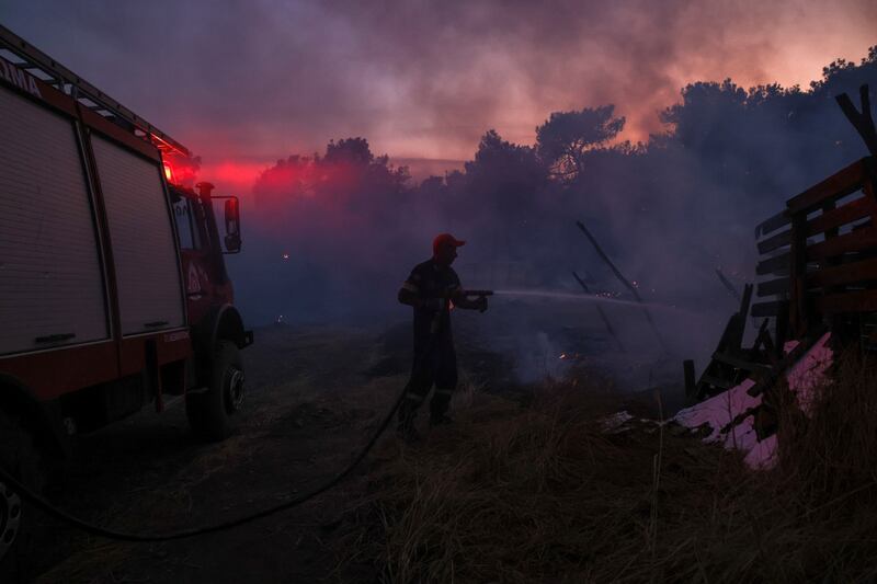 2023-09-02T192303Z_2046296270_RC2I03A8W63Q_RTRMADP_3_EUROPE-WEATHER-GREECE-WILDFIRE.JPG