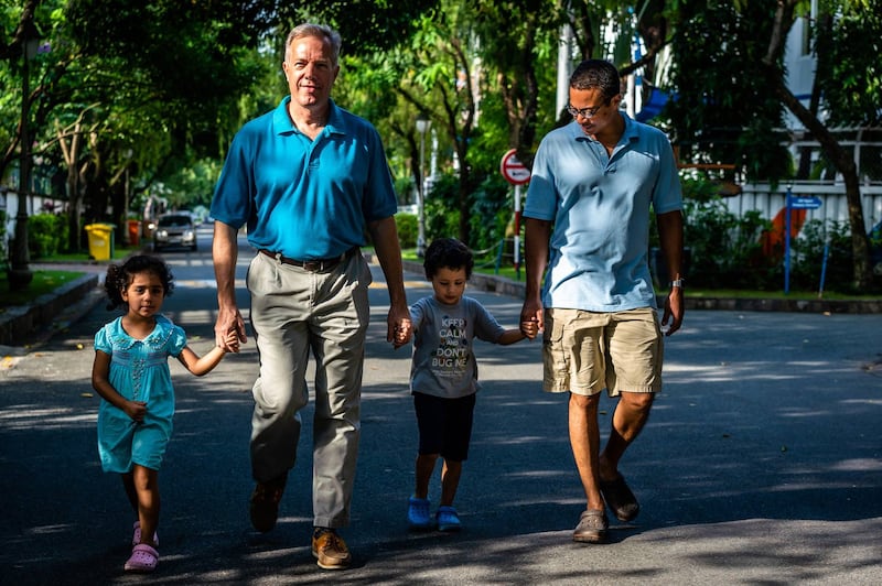 Ted Osius, with his spouse Clayton Bond and their children, in an undated photo. Credit: Ted Osius