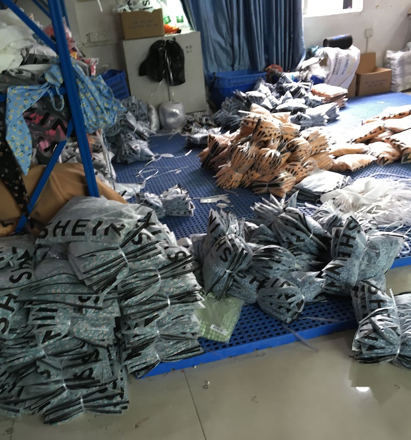 Newly made clothes packed in SHEIN bags await shipment from a Guangzhou garment factory in this undated photo.