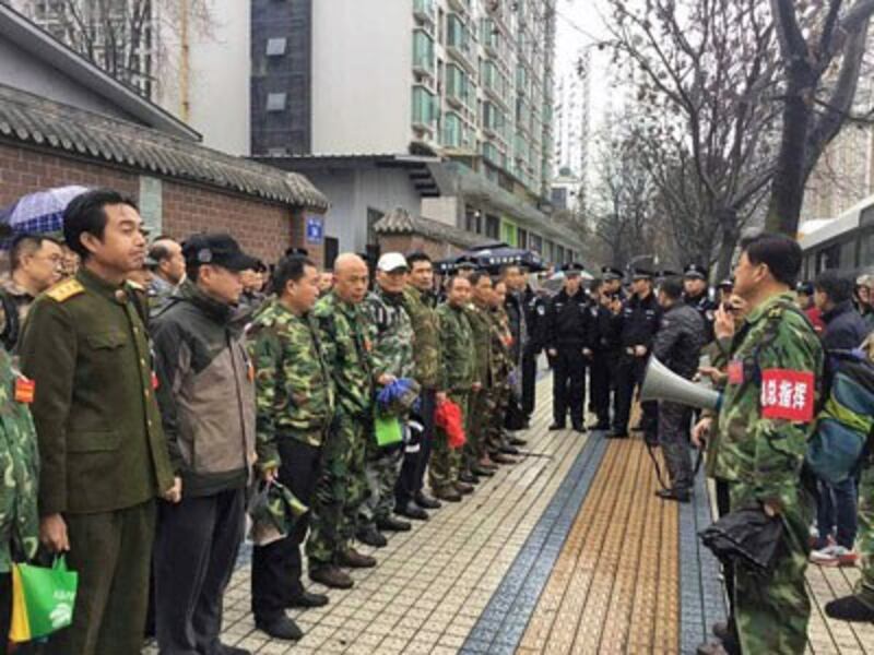 PLA veterans protest outside provincial government offices in southwestern China's Sichuan province, Feb. 22, 2017. 