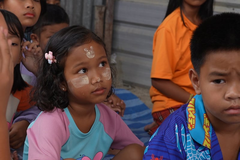 Children of Burmese workers attend mobile classrooms at a construction camp in Samut Sakhon province, Thailand, Oct. 15, 2024.