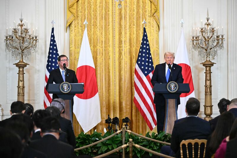 US President Donald Trump (R) and Japanese Prime Minister Shigeru Ishiba hold a joint press conference in the East Room of the White House in Washington, DC, on Feb. 7, 2025.