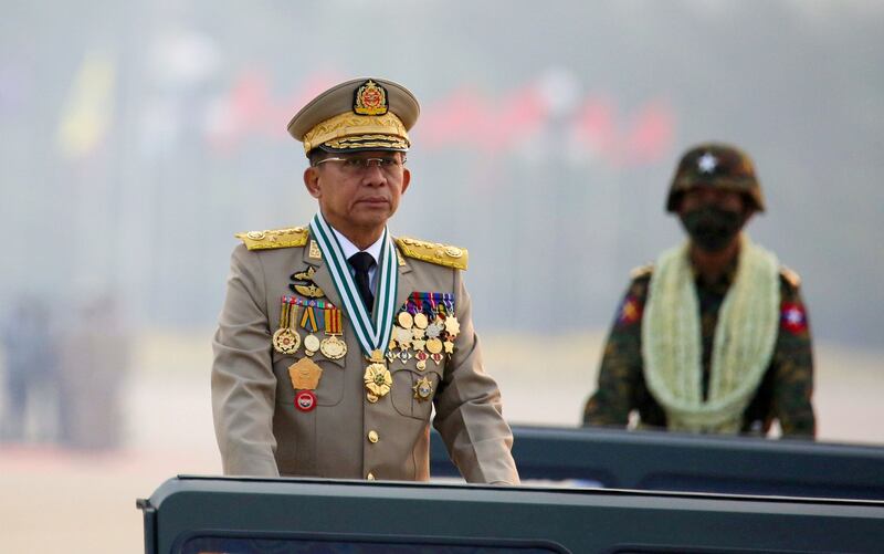 Myanmar's military ruler Min Aung Hlaing presides over an army parade on Armed Forces Day in Naypyitaw, Myanmar, March 27, 2021. Reuters