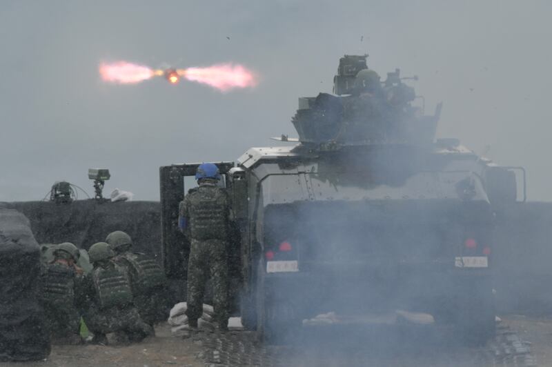 A US-made TOW-2A wire-guided anti-tank missile is launched by Taiwanese soldiers from a M1167 TOW carrier vehicle during a live fire exercise at the Fanshan training grounds in Pingtung county on Aug. 26, 2024.