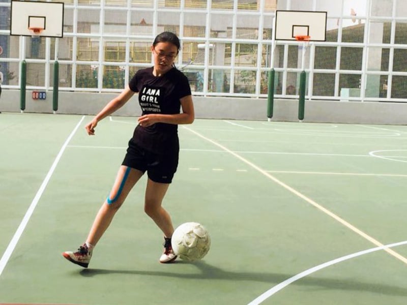 Joey Siu relaxes at a sports facility in Hong Kong, before she was forced to leave.