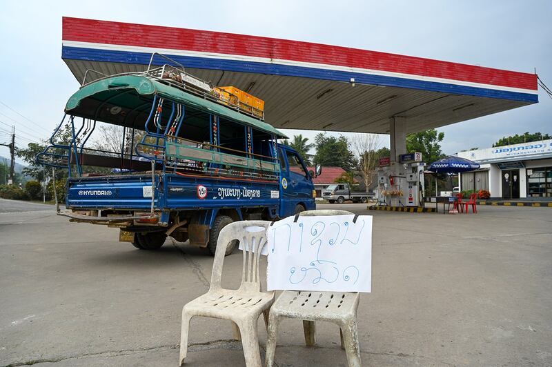 A sign reading "no diesel" sits in front of a gas station in Luang Prabang, Laos, Jan. 28, 2024. (Tang Chhin Sothy/AFP)