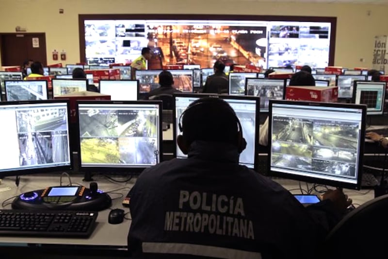 A technician works on a video surveillance system on Beijing's Tiananmen Square.