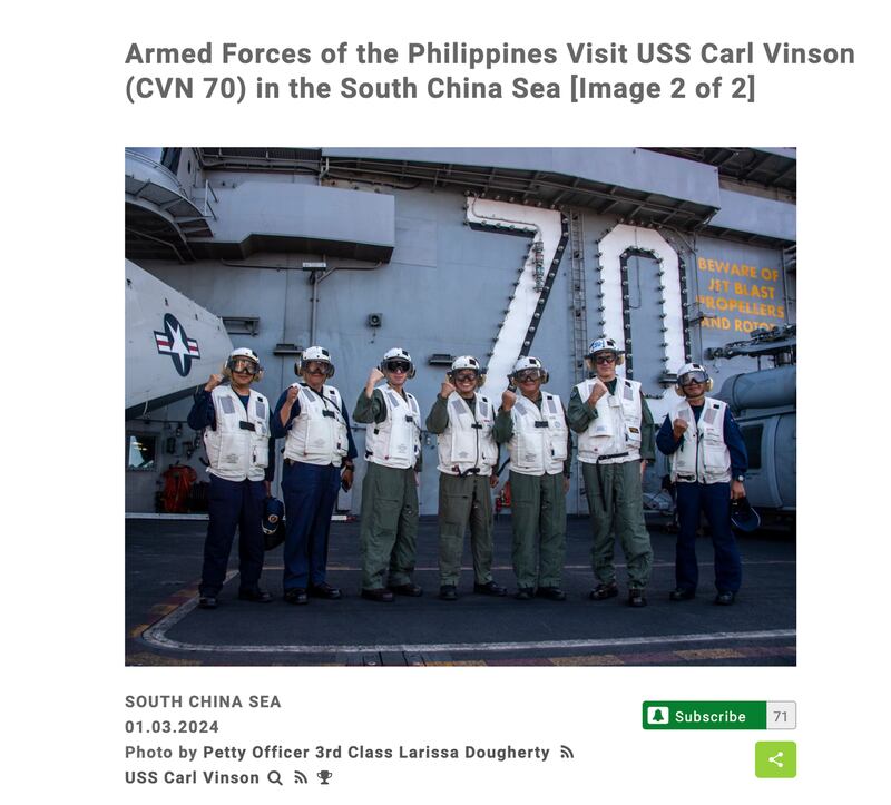 Leaders from the Philippine and U.S. Navy take a picture aboard the USS Carl Vinson during the joint patrols. (Screenshot/Defense Visual Information Distribution Service)