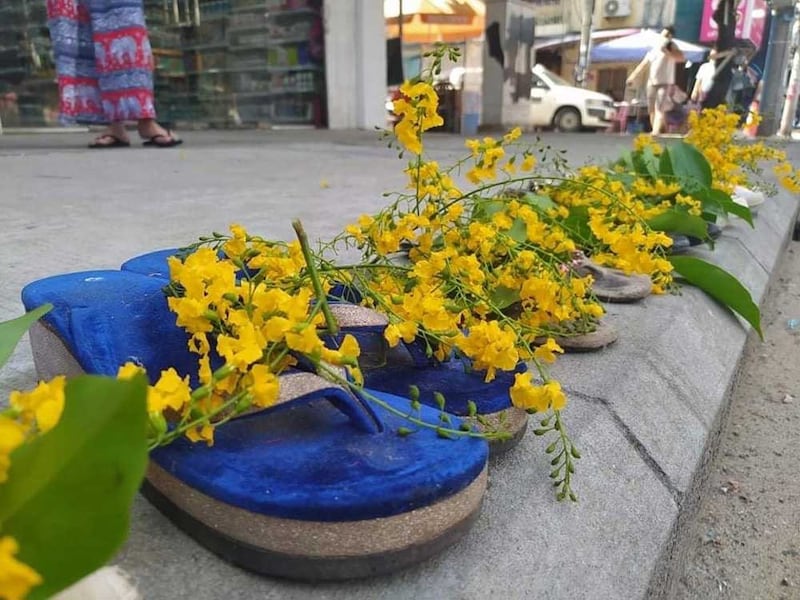 The arrangements included collections of many types of shoes, such as these in Sanchaung, Yangon (RFA)