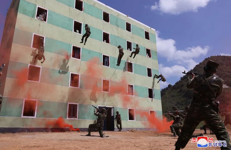 Korean People's Army special operations force train at a five-story building at a base, Sept. 11, 2014.