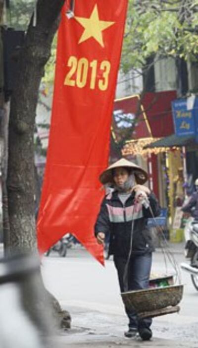 Sao vàng nền đỏ trên khắp nẻo đường. AFP