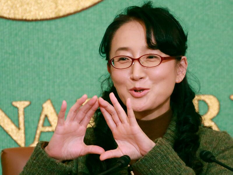 Award-winning author Yu Miri, a Zainichi citizen of South Korea, speaks at a news conference in Tokyo, Dec. 23, 2020.