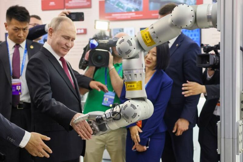 Russian President Vladimir Putin (2nd L) visits an exhibition at the Harbin Institute of Technology in Harbin, northeastern China's Heilongjian province, May 17, 2024. (Mikhail Metzel/Sputnik/Kremlin Pool Photo via AP)