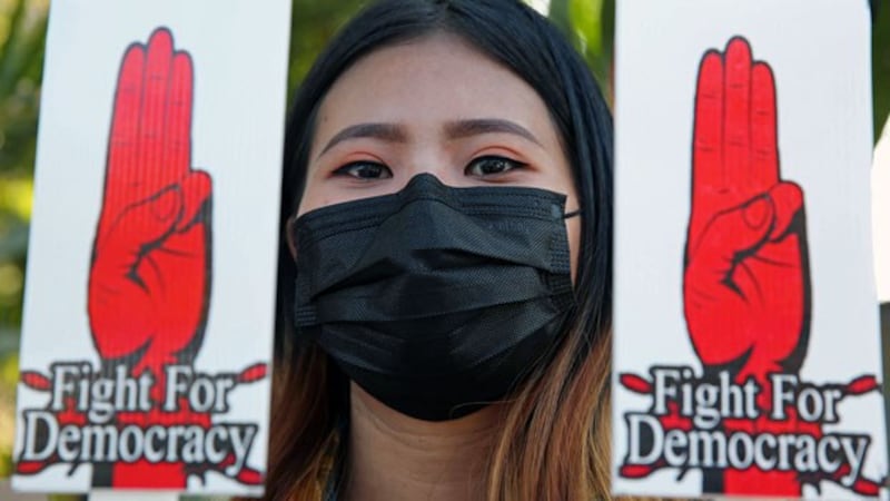 myanmar-protester-yangon-feb11-2021.jpg