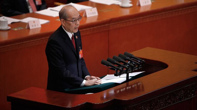 图片：2019年3月12日，中国全国人大会议举行第三次全体大会，听取最高人民检察院检察长张军总结去年工作。（美联社）