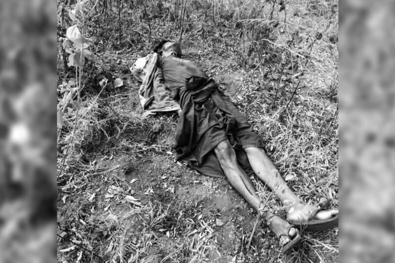 The body of one of the six men taken from Myingyan, Mandalay region, by Myanmar junta forces lies near a highway intersection, Dec. 14, 2022. The victims' hands were tied behind their backs and they appear to have been tortured. The photo was converted from color to black and white. Credit: Citizen Journalist