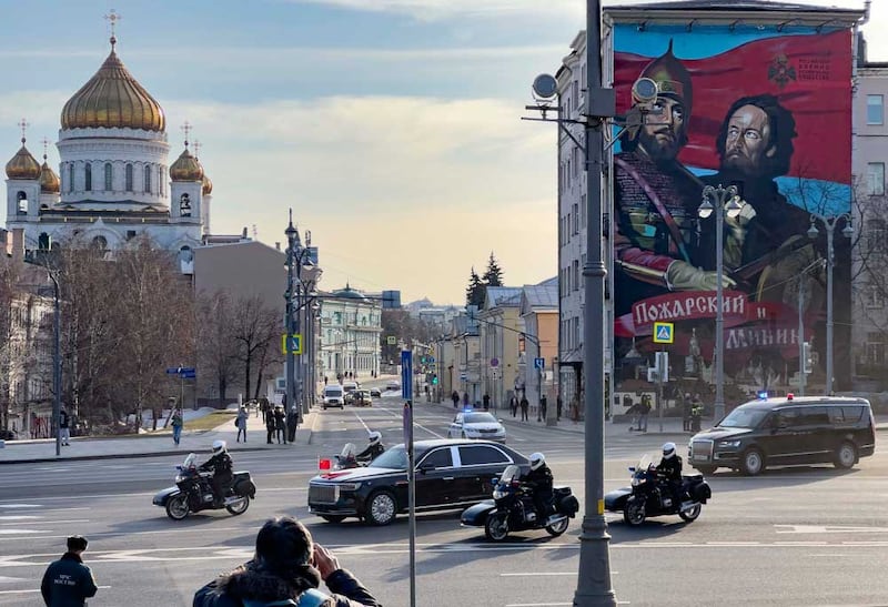 Chinese President Xi Jinping's motorcade is driven toward The Kremlin in Moscow, Russia, Monday, March 20, 2023. (AP Photo)