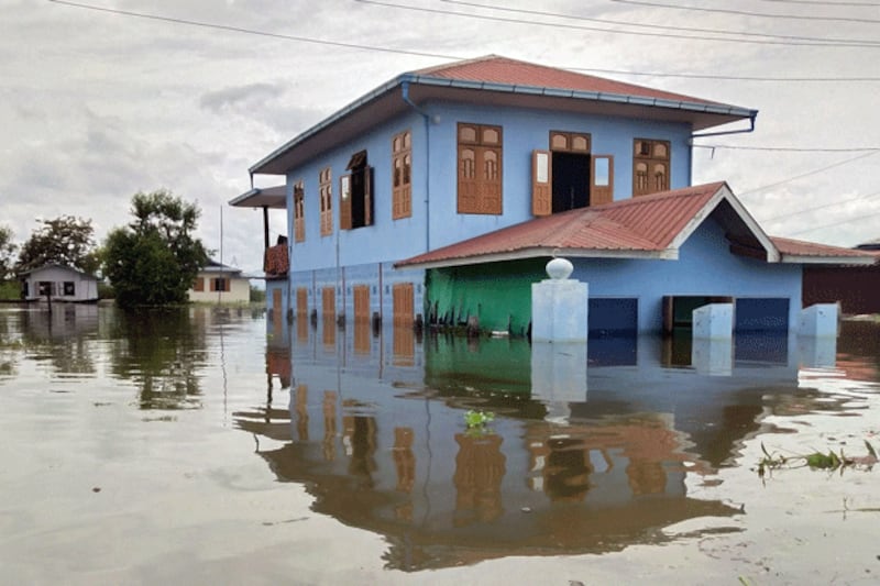 Homes are inundated by floodwaters at Inle Lake in Myanmar's southern Shan state following Typhoon Yagi, Sept. 14, 2024. (STR/AFP)