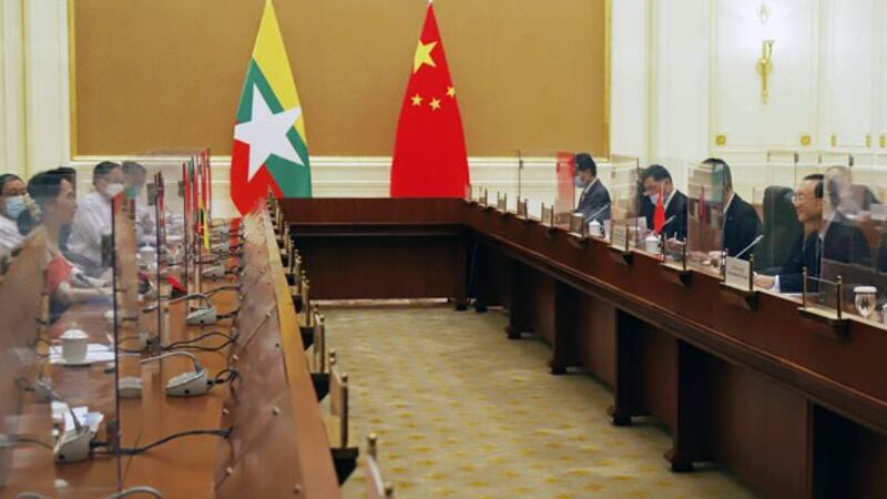 Myanmar's State Counselor Aung San Suu Kyi (R) meets with Yang Jiechi (L), director of the Office of Foreign Affairs of the Communist Party of China, at the Presidential Palace in Naypyidaw, Sept. 1, 2020