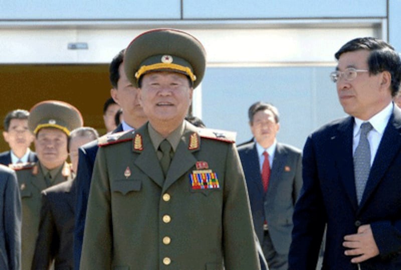 Choe Ryong Hae (C) leaves Pyongyang airport to visit China as a special envoy of Kim Jong Un, May 22, 2013. 