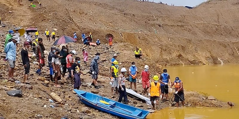 Rescuers recover a body [not shown] following a landslide at a jade mine in Hpakant, Kachin state, Myanmar, Tuesday, Aug. 15, 2023. Credit: Screenshot from video obtained by Reuters