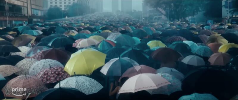 An image from "Expats" that depicts the Umbrella Movement in Hong Kong. In the first two episodes of the show, there are scenes of protesters with umbrellas. (Prime Video)