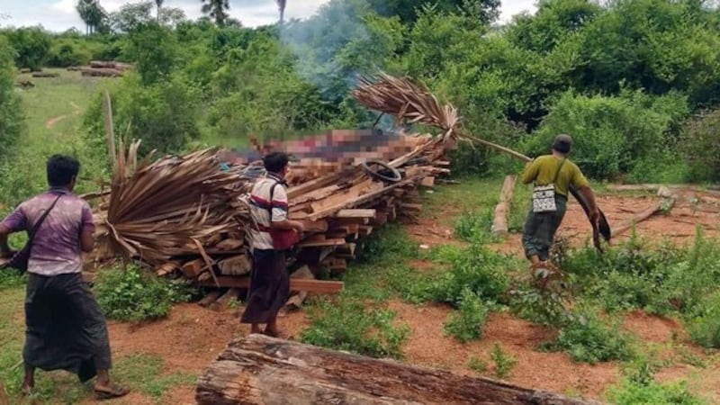 Residents prepare to cremate some of the civilians killed by junta troops in Sone Chaung village, Yinmarbin township, northwestern Myanmar's Sagaing region, July 21, 2023. Credit: Citizen journalist