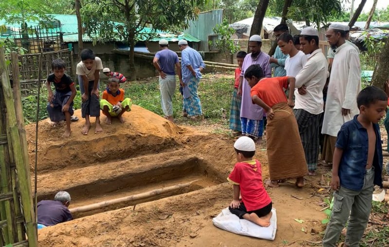 A grave is prepared for Muhib Ullah, a Rohingya leader who was assassinated in the Kutapalong camp in Bangladesh, Sept. 31, 2021. Credit: AP