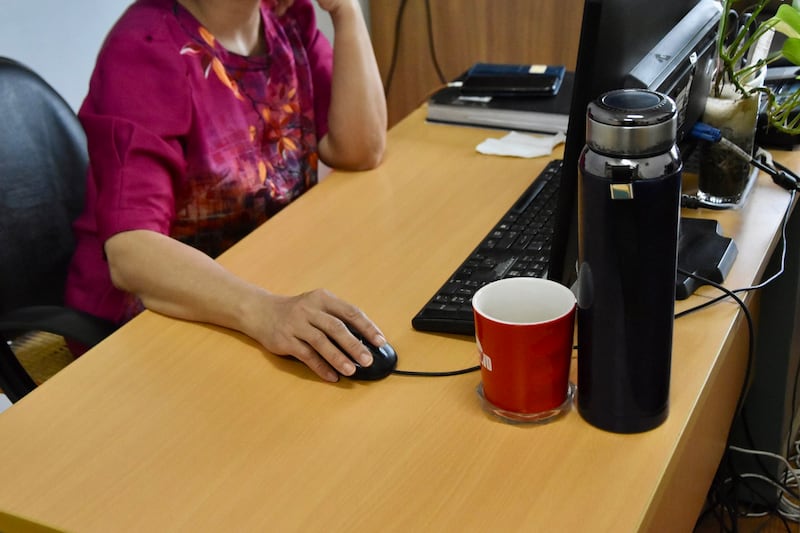 Bich, who has worked for the Peace House Shelter hotline since 2007, at her desk at the CWD offices in Hanoi. August 21. Allegra Mendelson.jpg