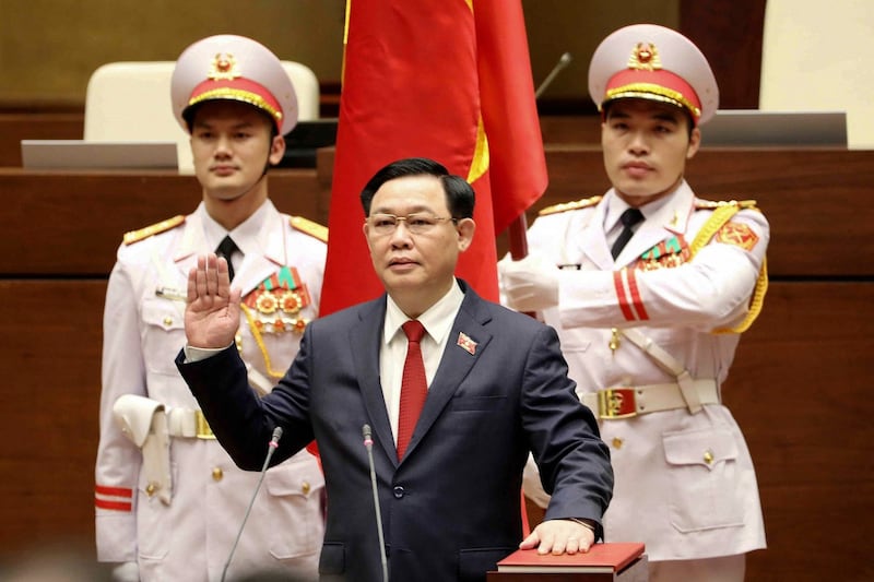 Vietnam's National Assembly Chairman Vuong Dinh Hue takes the oath of office during the National Assembly's spring session in Hanoi, March 31, 2021. Credit: Vietnam News Agency/AFP