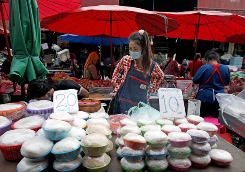 Migrant workers from Myanmar work at a street market in Bangkok, Thailand, in 2020. Credit: Soe Zeya Tun/Reuters